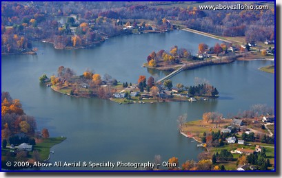 A somewhat low and close up aerial view of an island in Holiday Lakes near Willard, OH