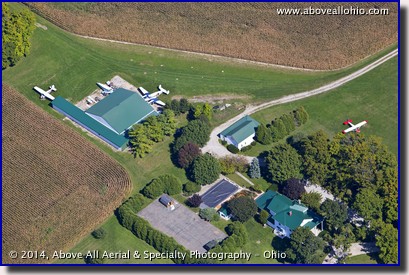 An aerial view of a collection of planes at a rural Ohio farm.