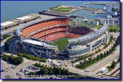 A low and close helicopter aerial view of construction going on at First Energy Stadium, home of the Cleveland Browns.