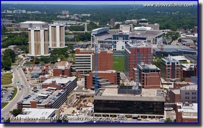 An aerial view of multiple construction projects on the Ohio State University medical campus taken at a very low altitude by helicopter, Columbus, Ohio