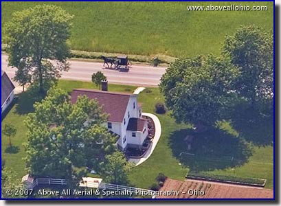 Aerial photo of of a horse and buggy traversing Ohio's Amish country
