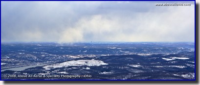 A panoramic aerial view of winter skies and distant snow near Pittsburgh, Pennsylvania