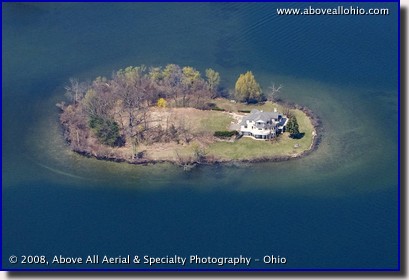 Aerial view of a residential lake island property