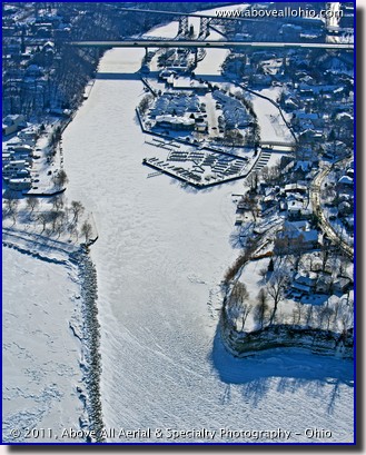 Aerial view of the Rocky River (Ohio) inlet and marina on a frozen Lake Erie