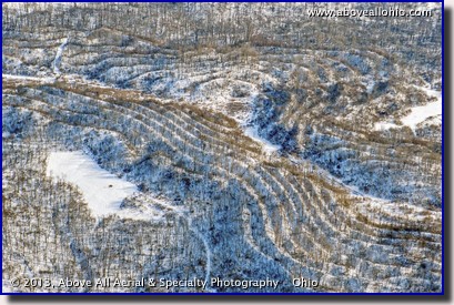 A winter aerial view of some unusal land features, visible only when the leaves are off of the trees; near Cadiz, in east-central Ohio.