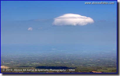 An air-to-air aerial view of a lone cloud somewhere over rural Ohio.