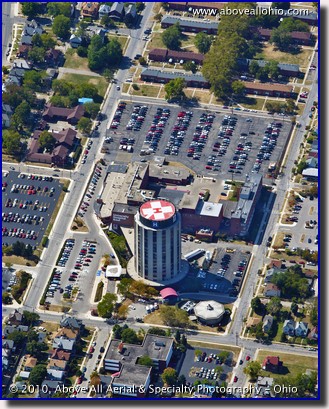 An oblique aerial view of the heliport on top of Ohio State's University Hospital East tower, just east of downtown Columbus, OH.