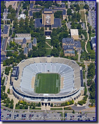 An aerial photo of the University of Notre Dame Stadium and the "Touchdown Jesus" mural in South Bend, Indiana.