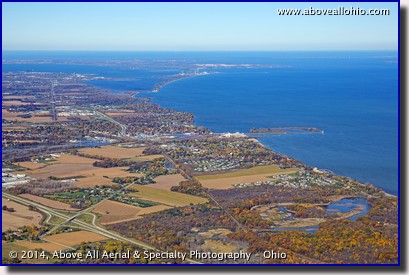 A wide angle aerial view of northern Ohio's Lake Erie coast line showing Huron, Sandusky, Cedar Point, Port Clinton, and the Lake Erie Islands.