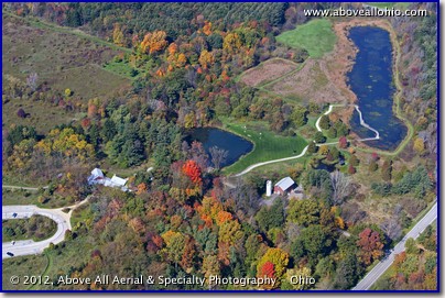 An aerial photo of beautiful fall colors in the the Medina (OH) County park known as the Alderfer-Oenslager Wildlife Sanctuary / Wolf Creek Environmental Center.
